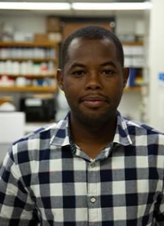 A portrait of Kelvin D. Aloryi